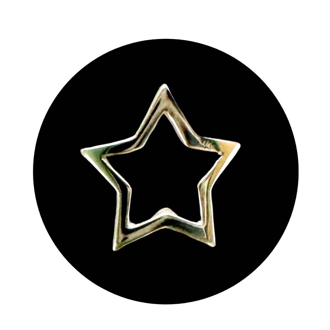 Hollow Star Tooth Charm