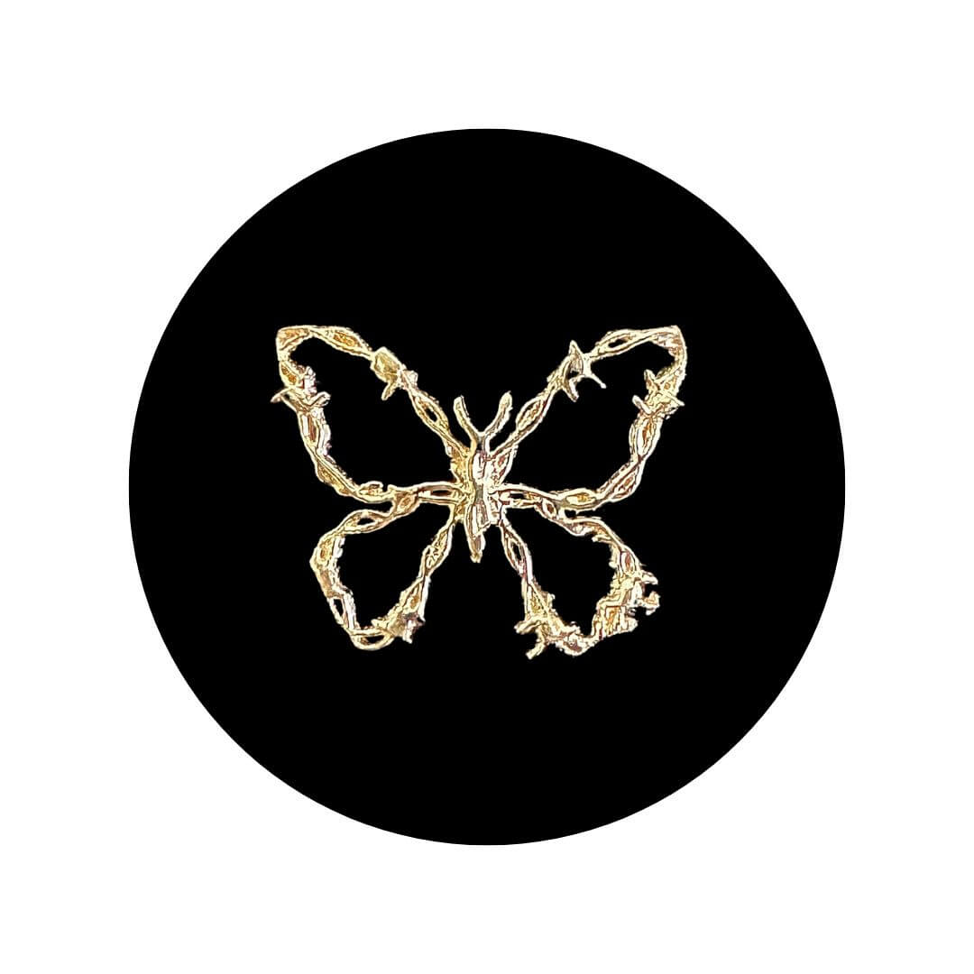 Barbwire Butterfly Tooth Charm