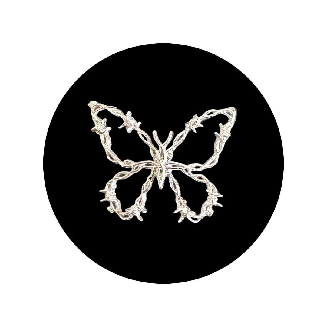 Barbwire Butterfly Tooth Charm